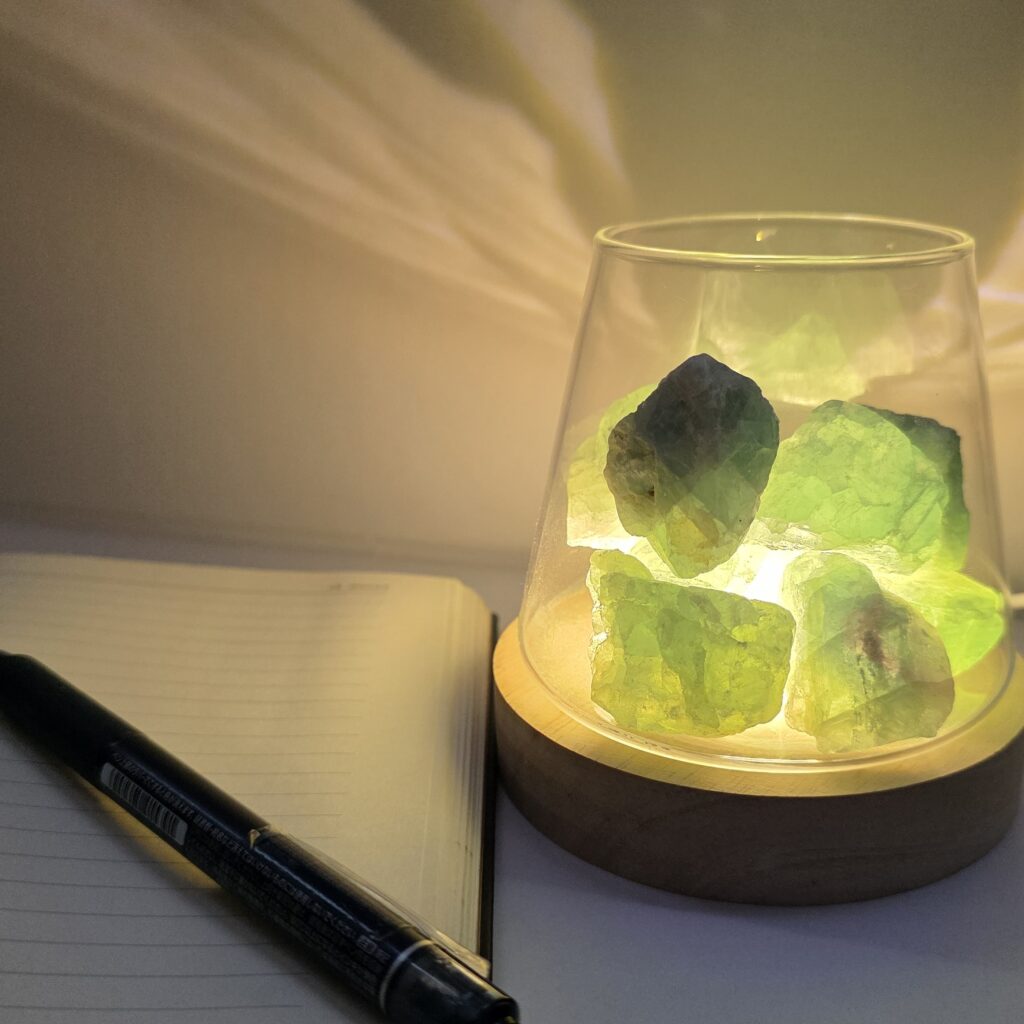 jade stone lamp with book and pen