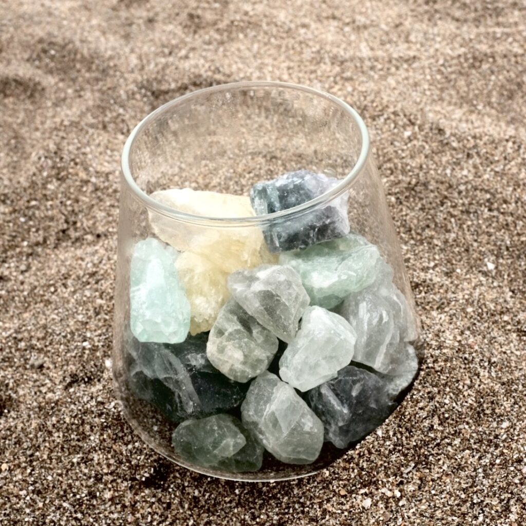 Natural Jade stone on the sand